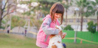 Girl with pet Dog